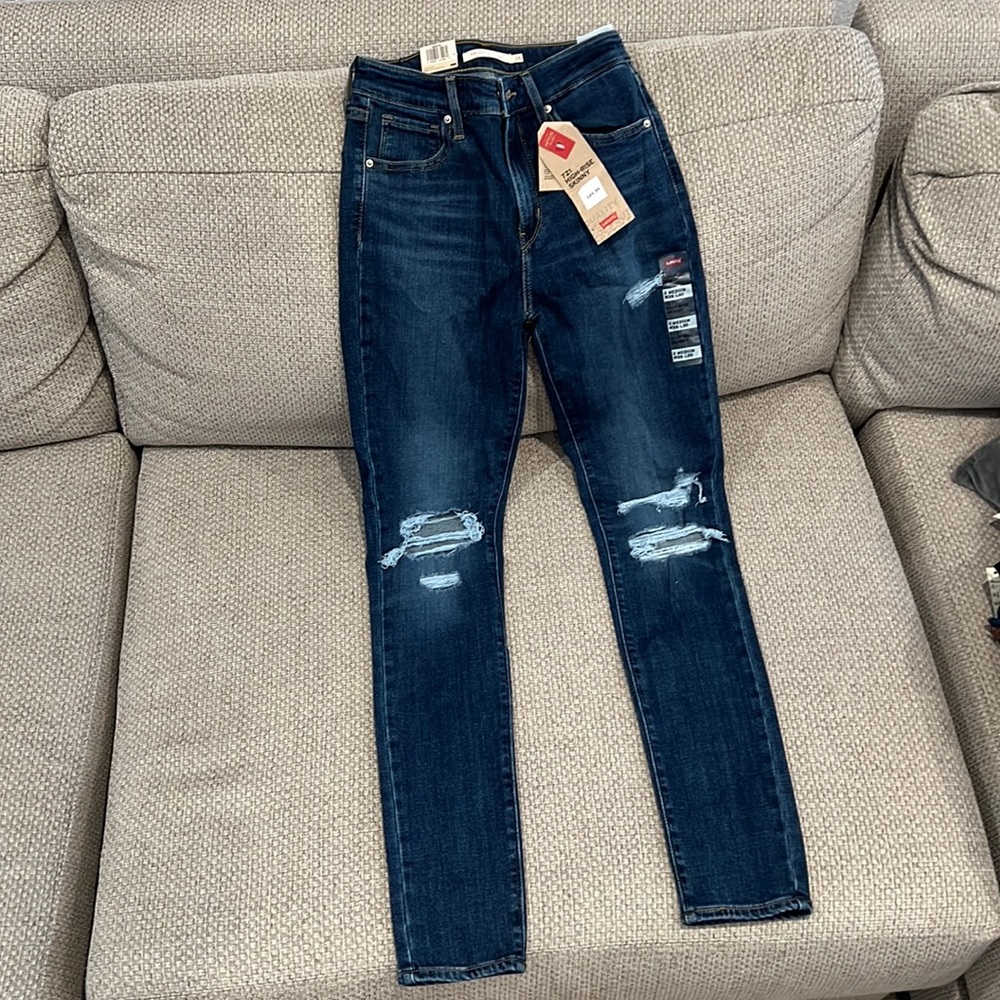 Distressed high rise skinny jeans